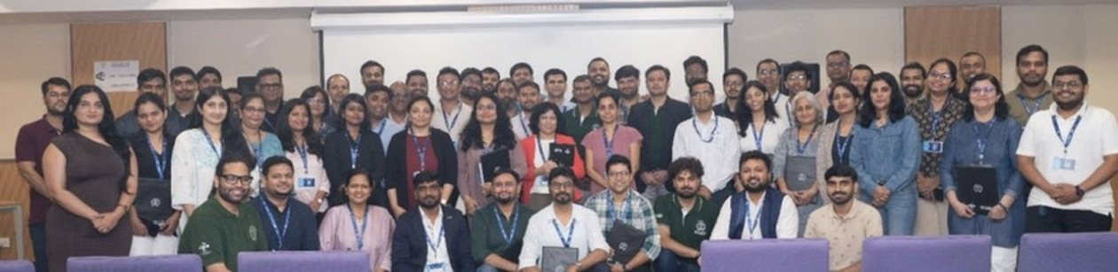 Participants and faculty of a programme at IIT Bombay, gathered for a group photograph